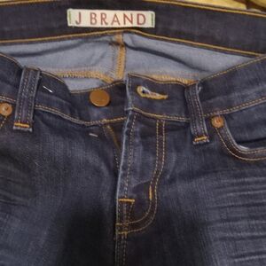 Size 26long J brand dark blue jeans.